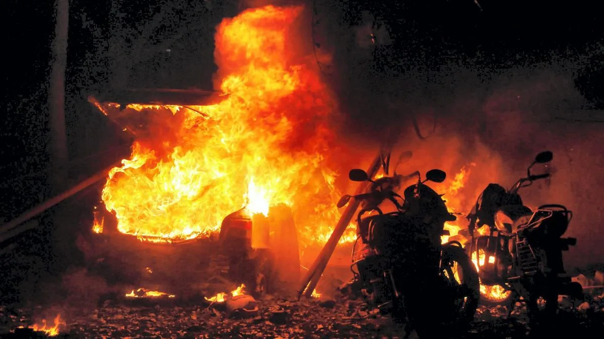 Vehicles burn after serial bomb blasts in Ahmedabad. File | Photo Credit: PTI