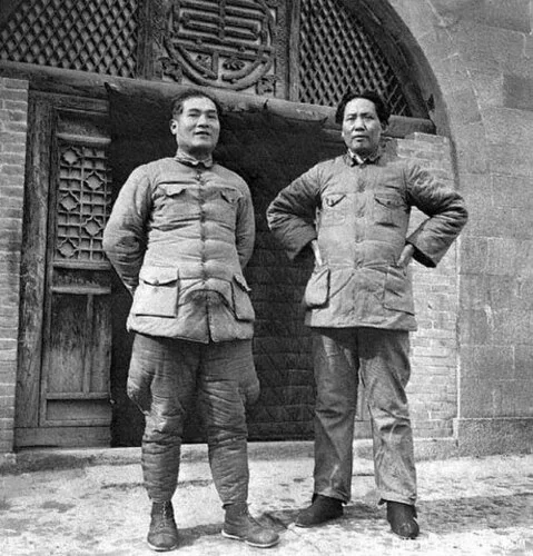 Mao (right) photographed at his base in Yan'an c. 1938